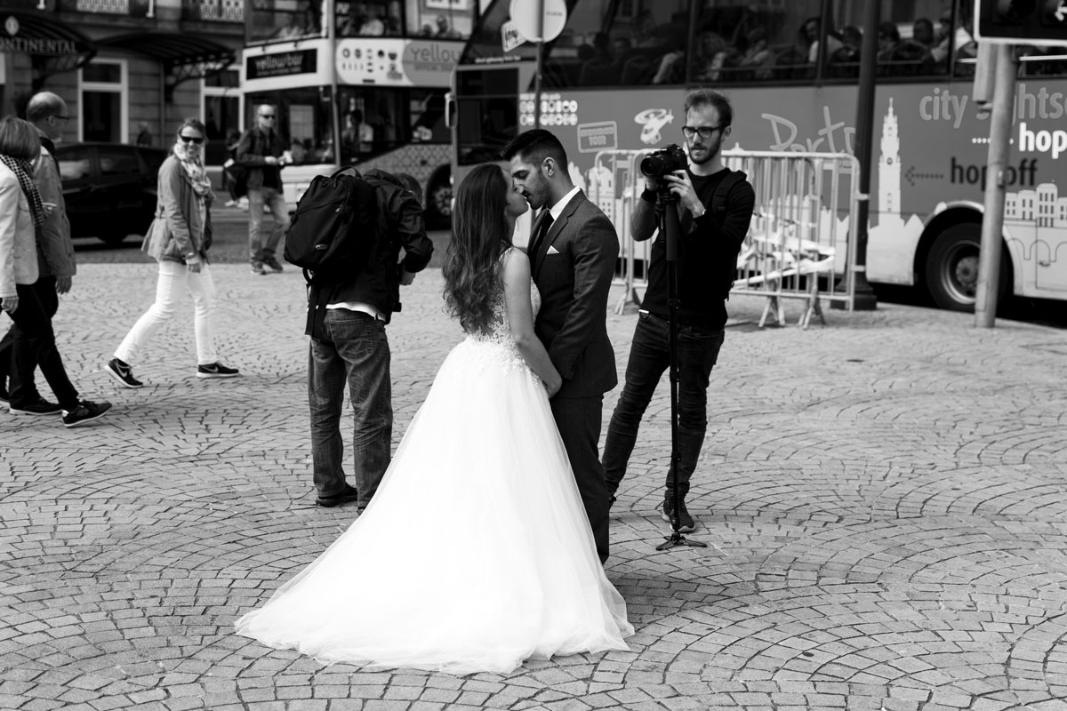 Man Wearing Black Suit Kissing Woman Wearing White Wedding Dress